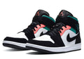 Air Jordan 1 Mid SE South Beach shoe featuring pine green, black and sail white leather with a signature swoosh.