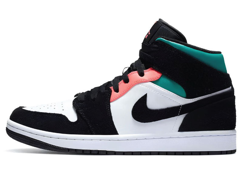 Air Jordan 1 Mid SE South Beach shoe featuring pine green, black and sail white leather with a signature swoosh.